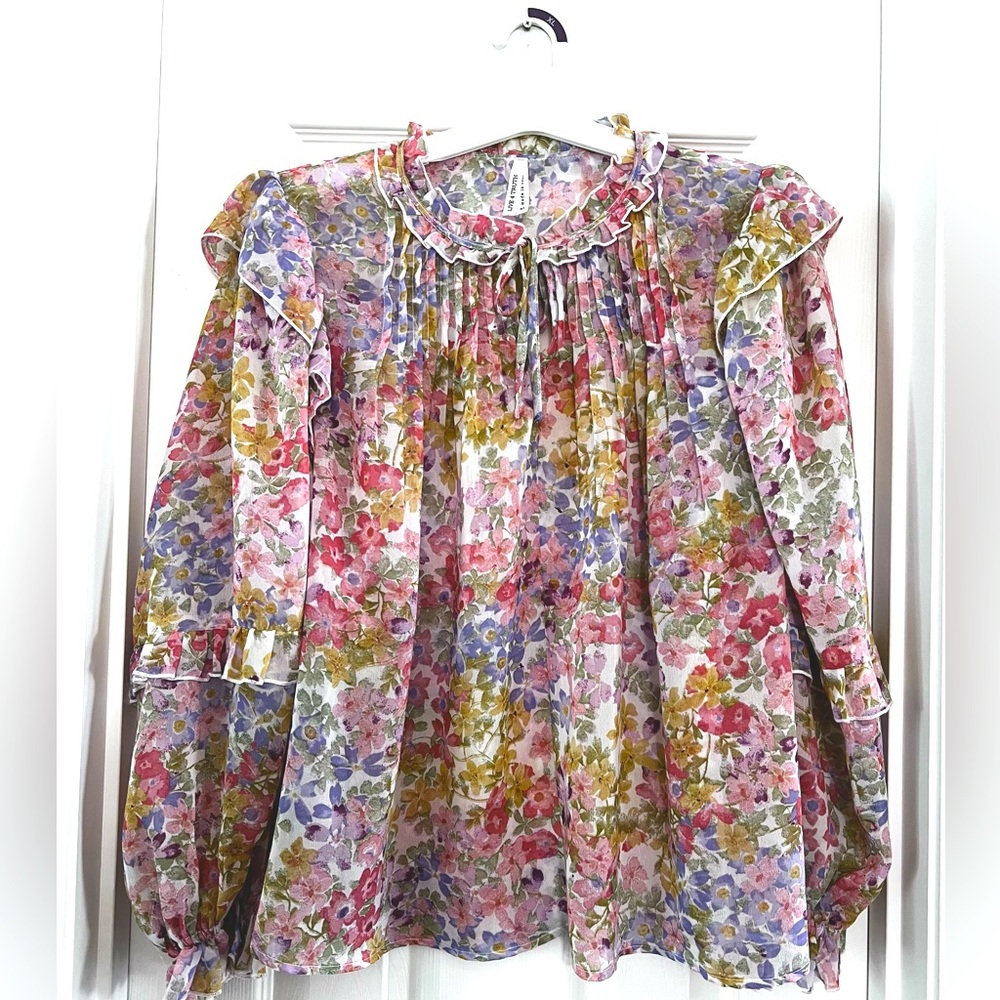 Live 4 Truth, Pastels-Floral long sleeves Sheer ruffled-Peasant blouse. Self Tie